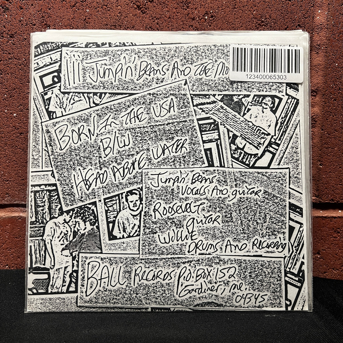 Used Vinyl: Jumpin' Beans And The Moustaches "Born In The USA / Head Above Water" 7" (Red Vinyl)