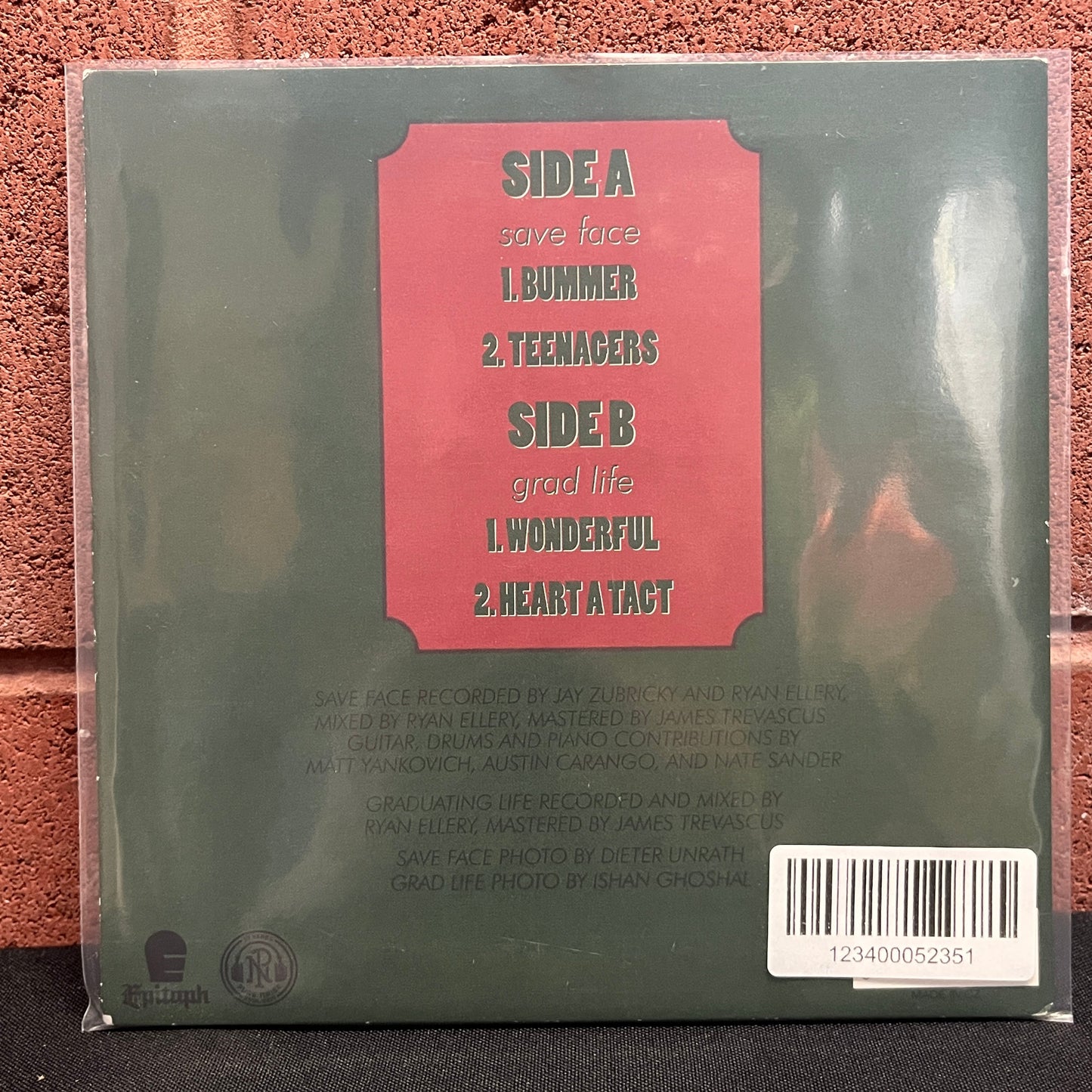 USED VINYL: Save Face / Grad Life "Split" 7" (Clear w/Red Splatter Vinyl)