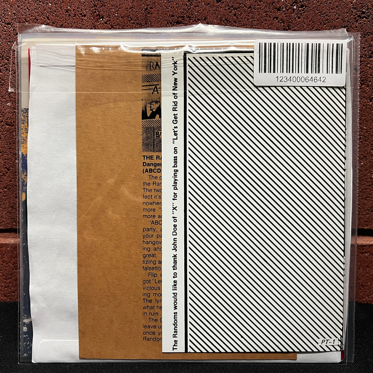 Used Vinyl: Randoms "A B C D / Let's Get Rid Of New York" 7" (Green Vinyl)