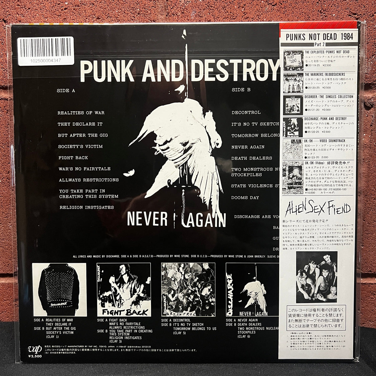 Used Vinyl: Discharge "Punk And Destroy" LP (1984 Japanese Issue w/ poster)