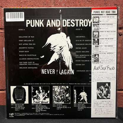 Used Vinyl: Discharge "Punk And Destroy" LP (1984 Japanese Issue w/ poster)