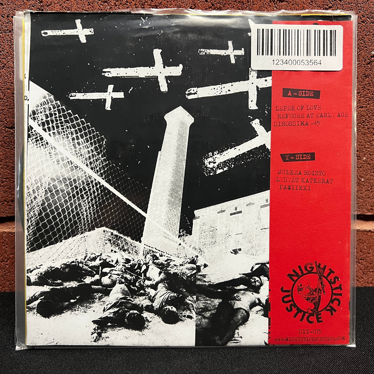 Used Vinyl: Armless Children / Ydinaseeton Pohjola "Split" 7" (Red Vinyl)