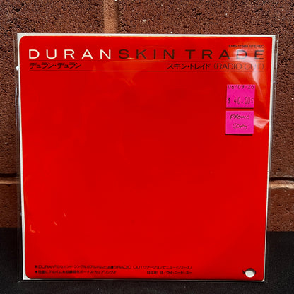Used Vinyl: Duran Duran "Skin Trade (Radio Cut) / We Need You" 7" (Japanese Promo Copy)