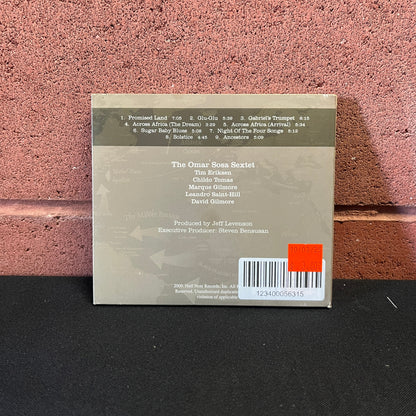 Used CD: Omar Sosa ‎"Across The Divide: A Tale Of Rhythm & Ancestry" CD